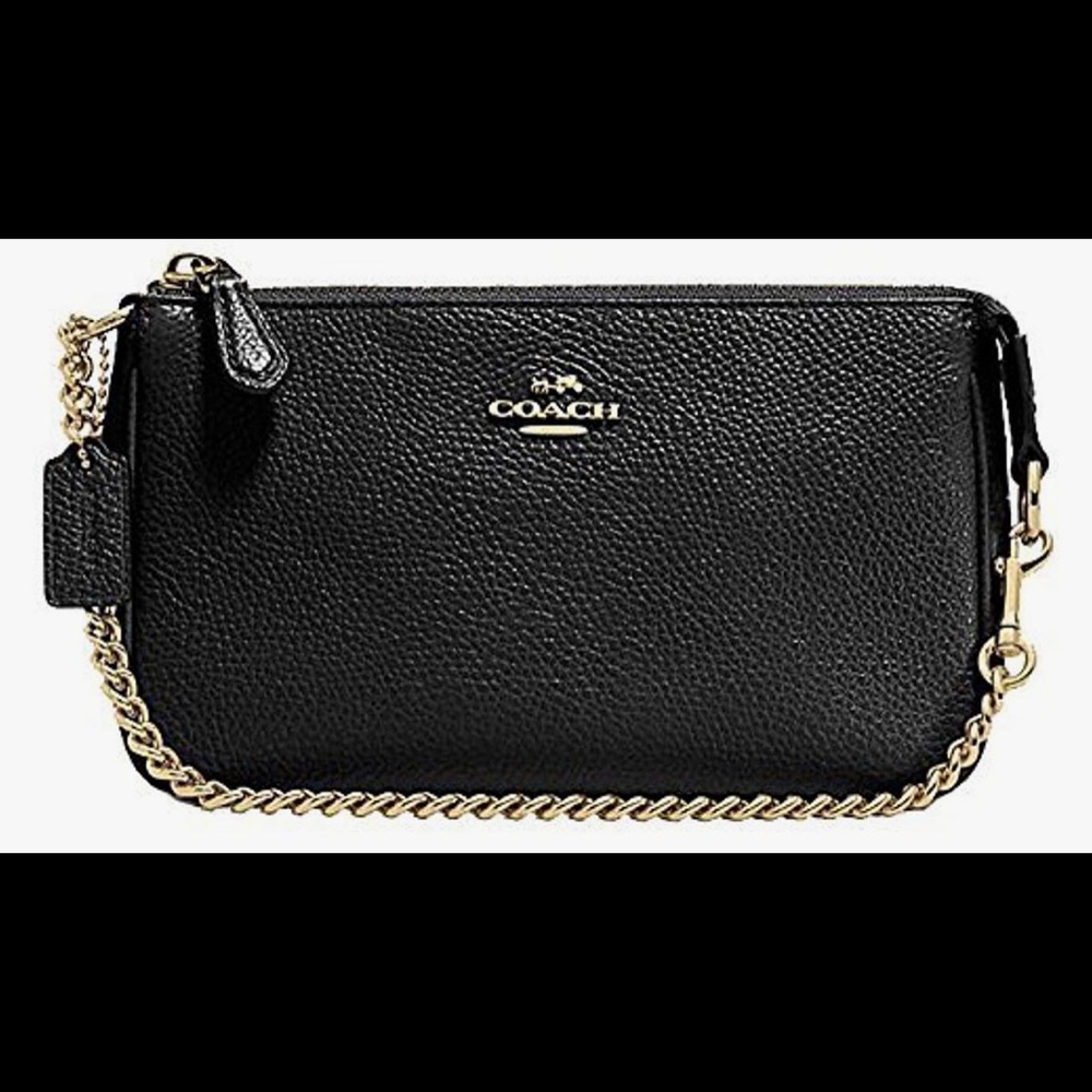 Pebbled leather Coach wristlet with gold chain strap.